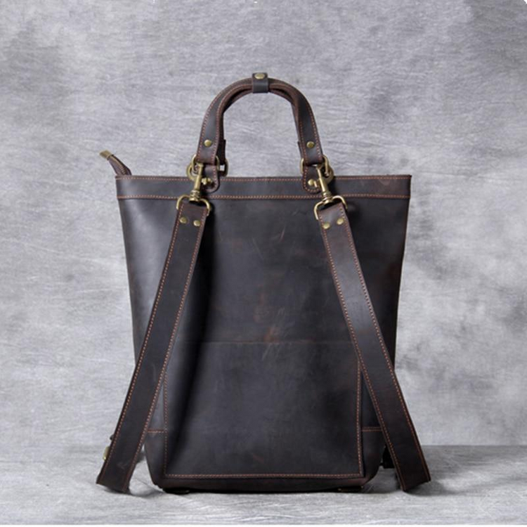 a brown leather bag with straps