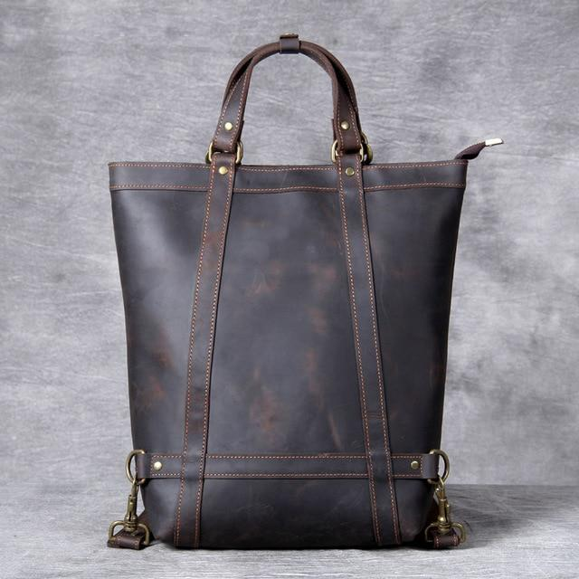 a brown leather bag with straps