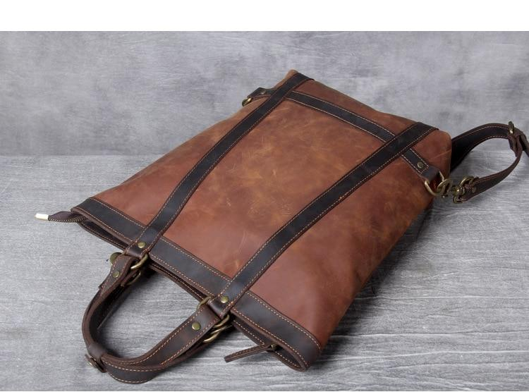a brown leather bag with straps