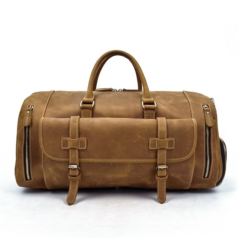 a brown leather bag with zippers