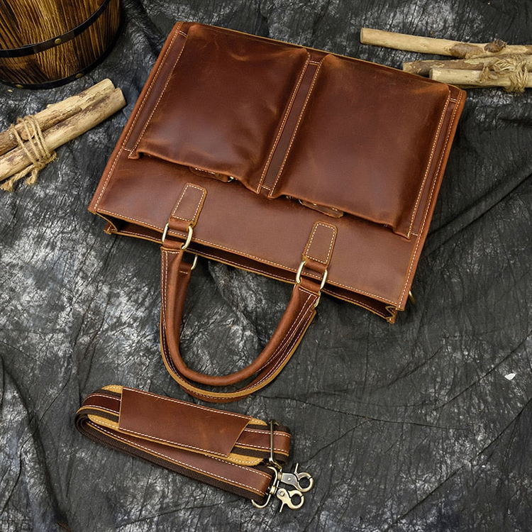 a brown leather bag and a key holder