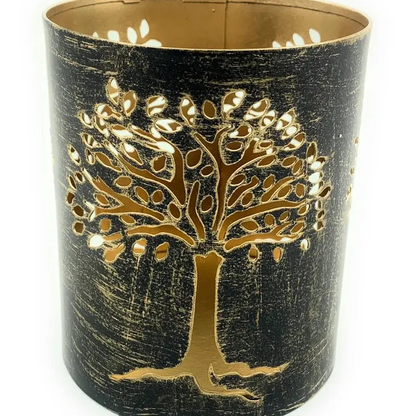 a black and gold candle holder