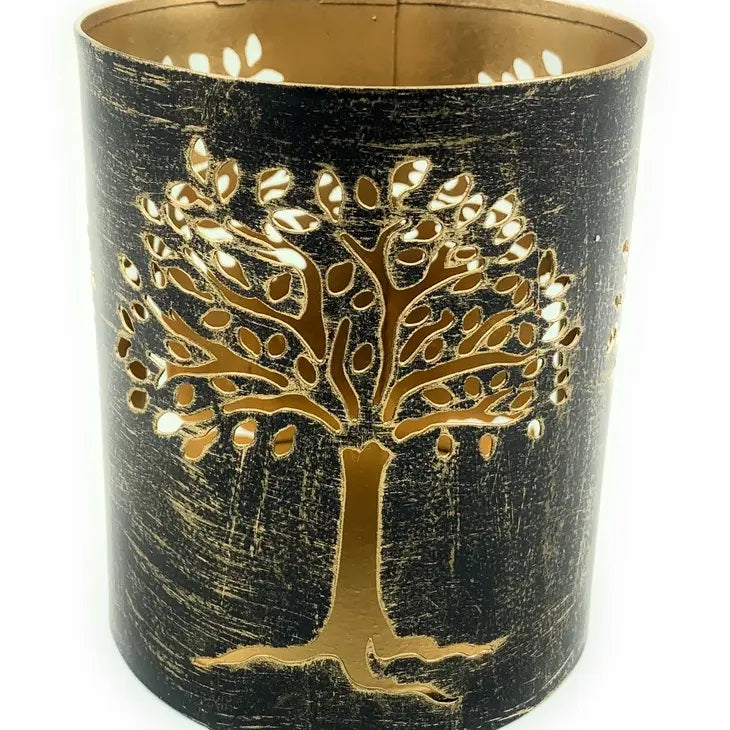 a black and gold candle holder