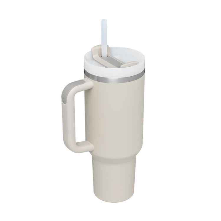 a white and grey coffee mug with a straw
