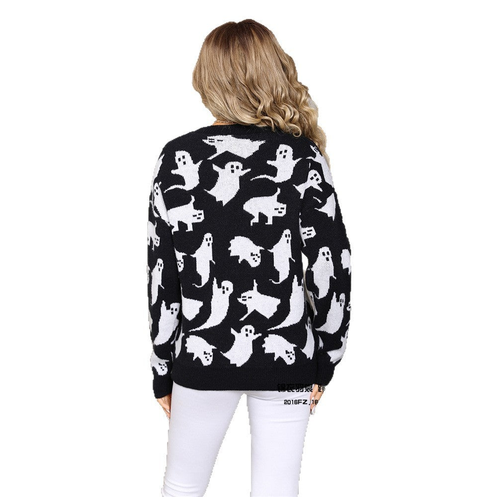 a woman wearing a black and white sweater with ghosts on it