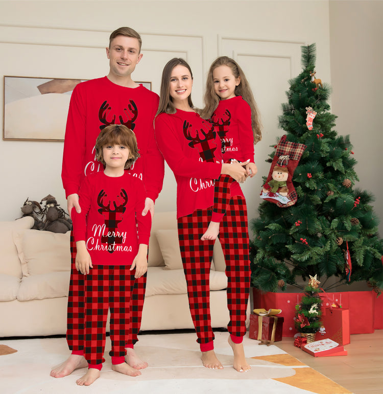 a family posing for a picture in pajamas