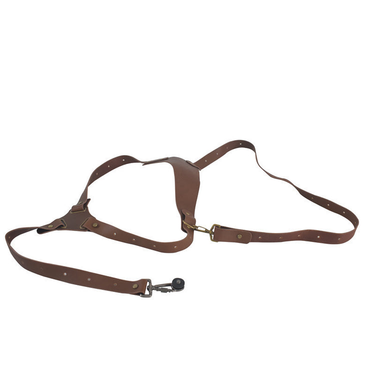 a brown leather strap with metal clasps