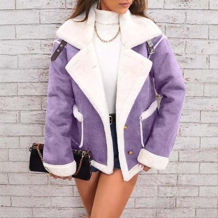 a woman in a purple coat