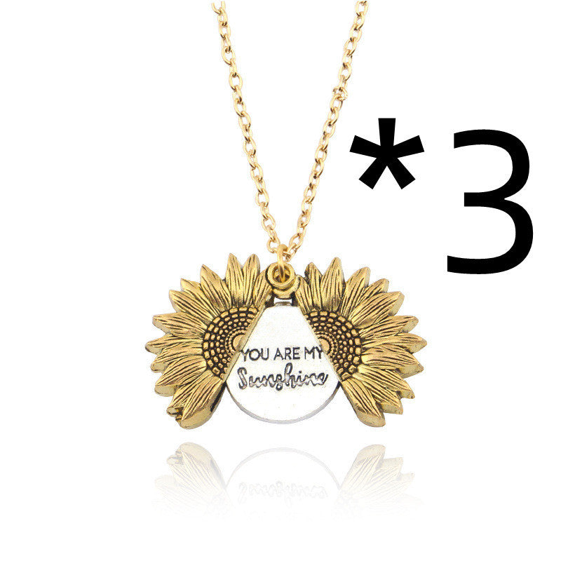 a necklace with a pendant and a chain