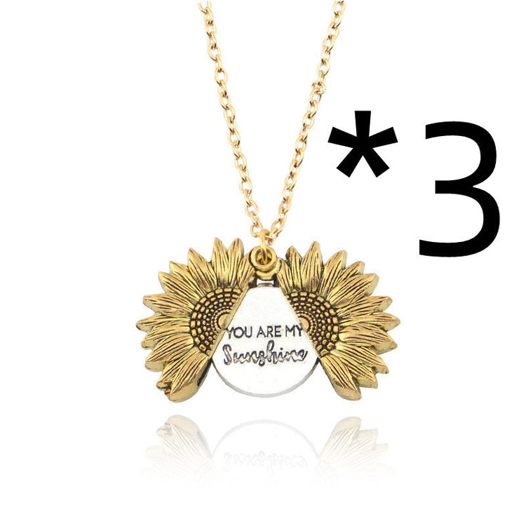 a necklace with a pendant and a chain