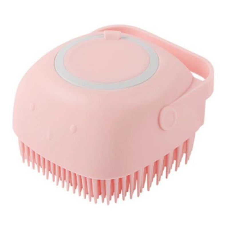 a pink brush with a handle