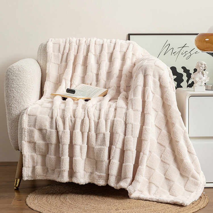 a chair with a blanket on it