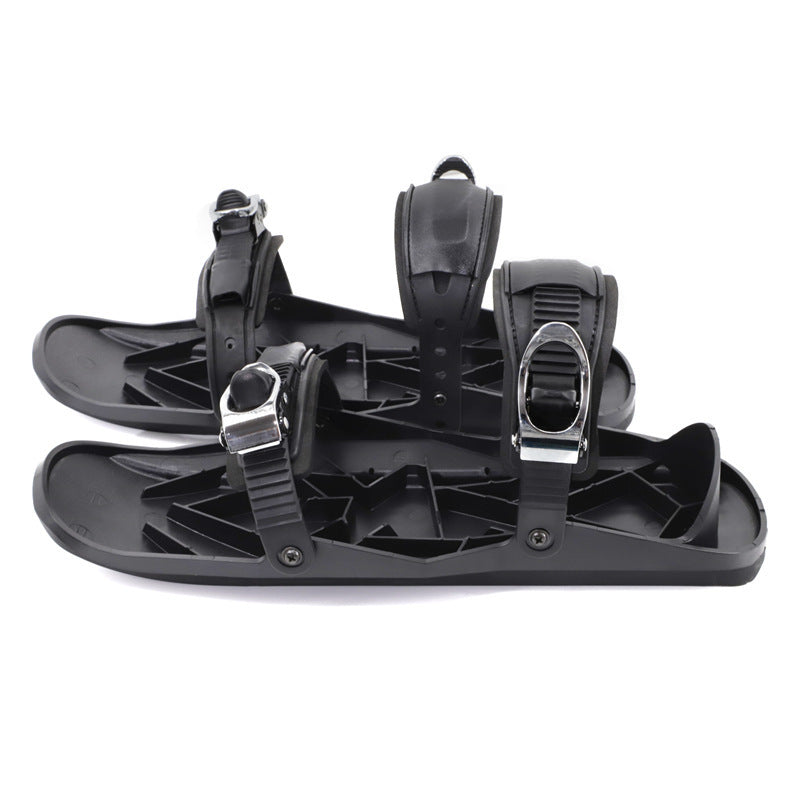 a pair of black snowshoes