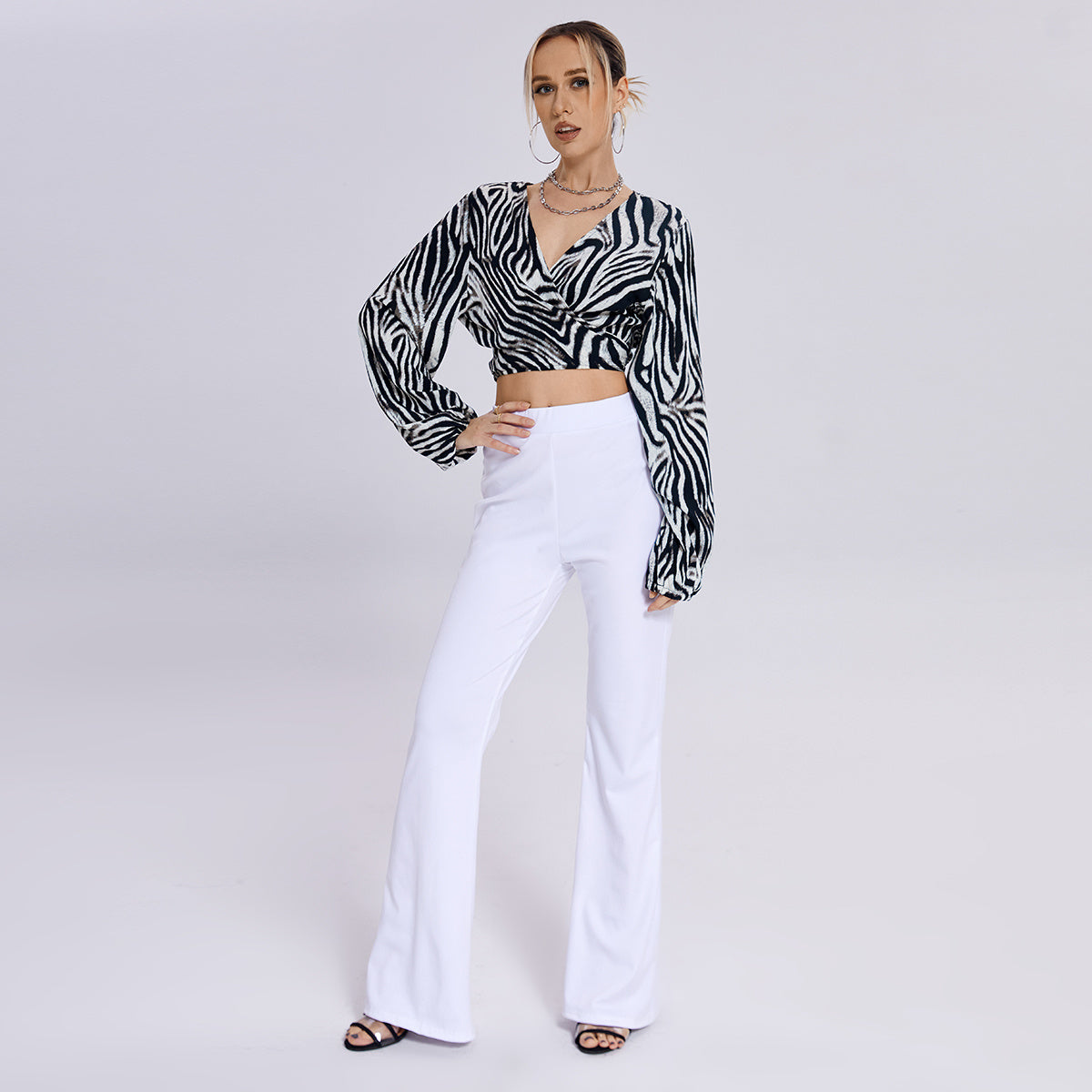 a woman in a zebra shirt