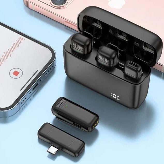a black box with a few devices next to it