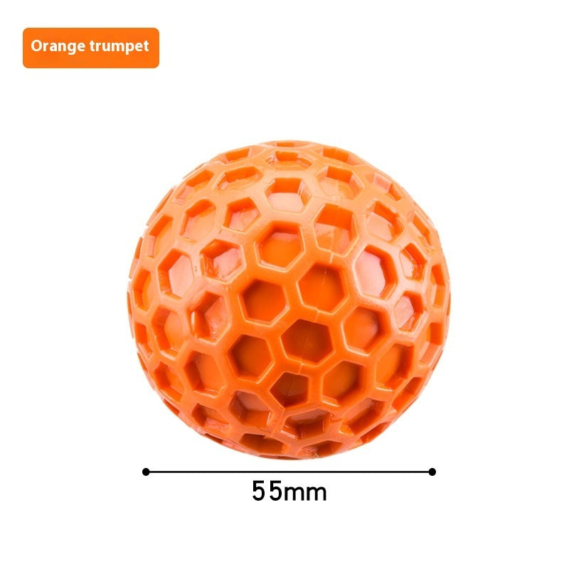 a small orange ball with a measuring tape