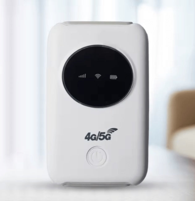 a white device with a black circle on it