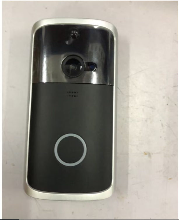 a black and silver device with a circle on the side
