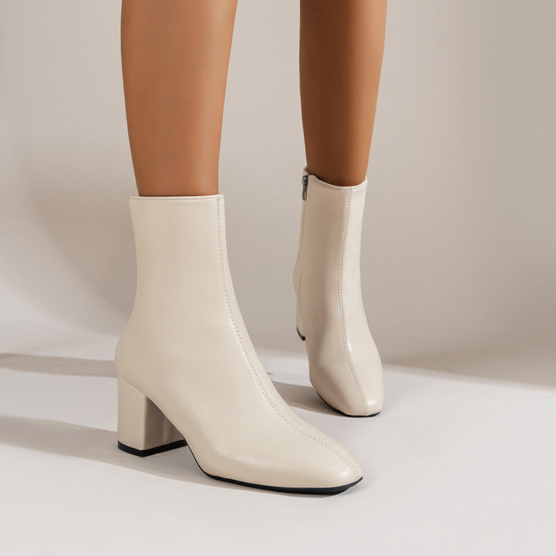 a person wearing white boots