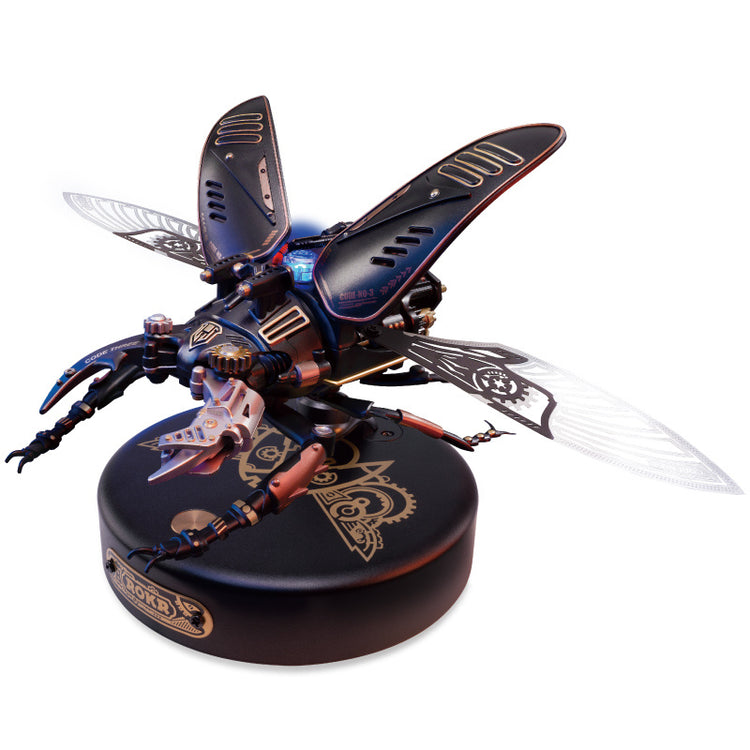 a mechanical insect on a round black surface