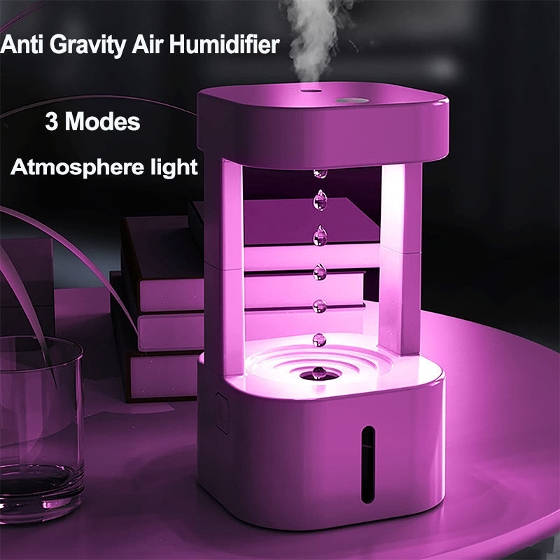 a purple humidifier with smoke coming out of it