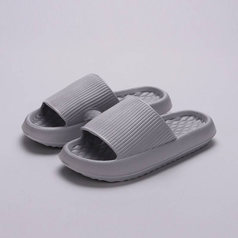 a pair of white slippers