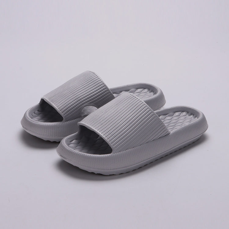 a pair of white slippers