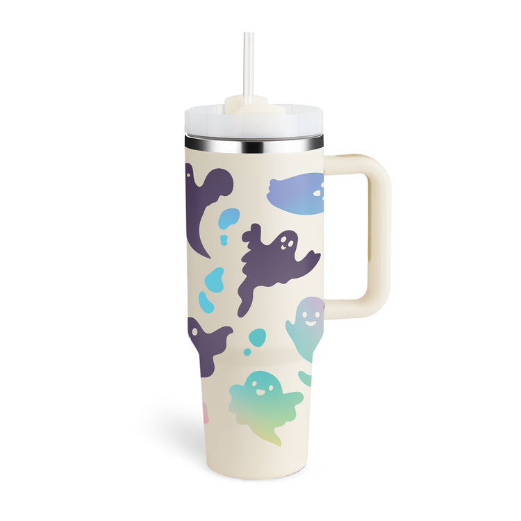 a white mug with a straw and a white lid with ghosts on it