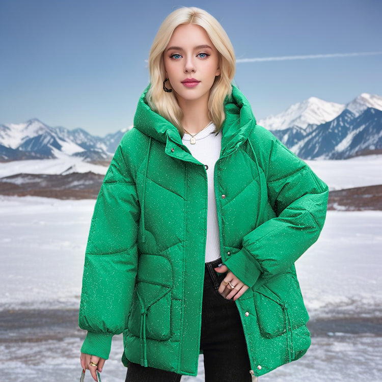 a woman in a green coat