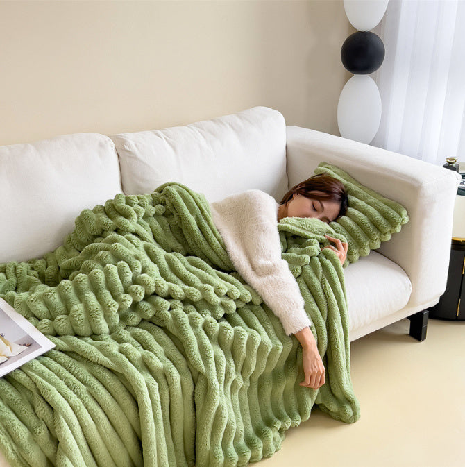 a woman sleeping on a couch