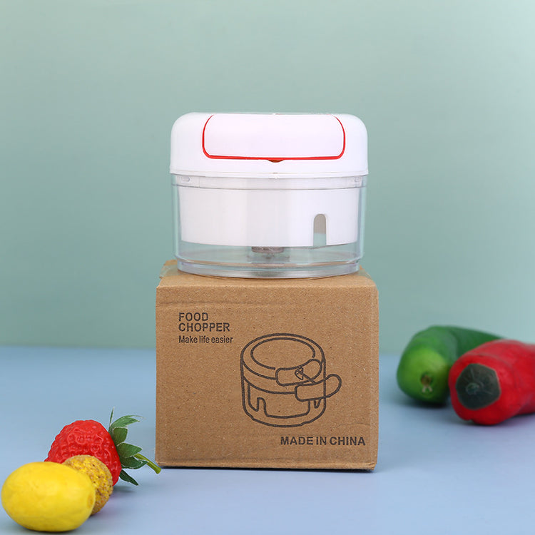 a small box with a grinder on top