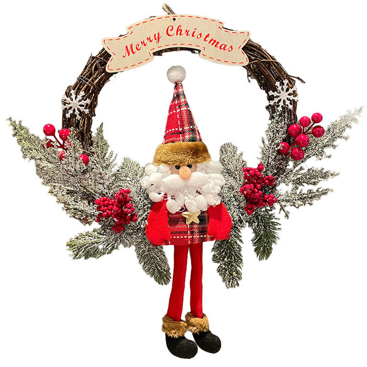 a christmas wreath with a santa claus and berries