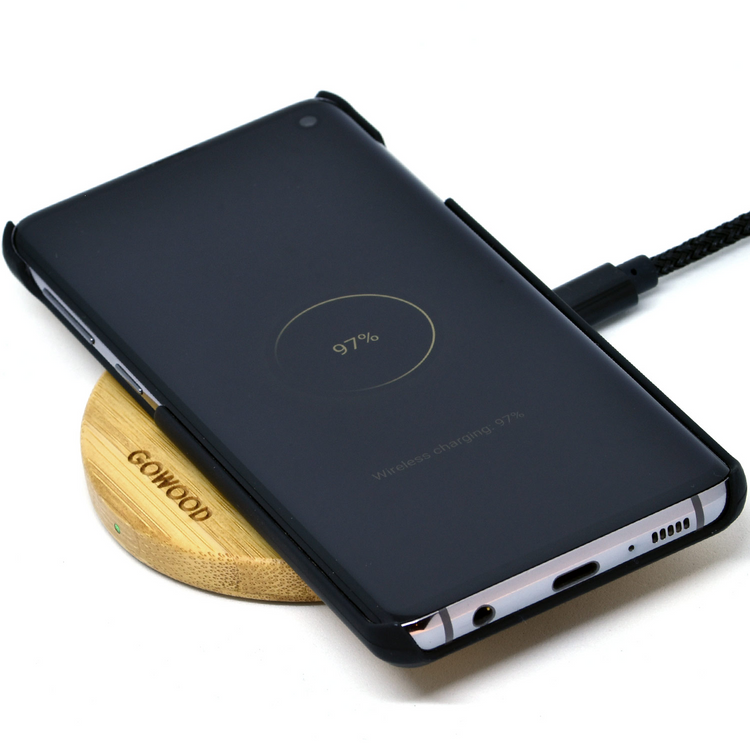 a cell phone charging on a wireless charger