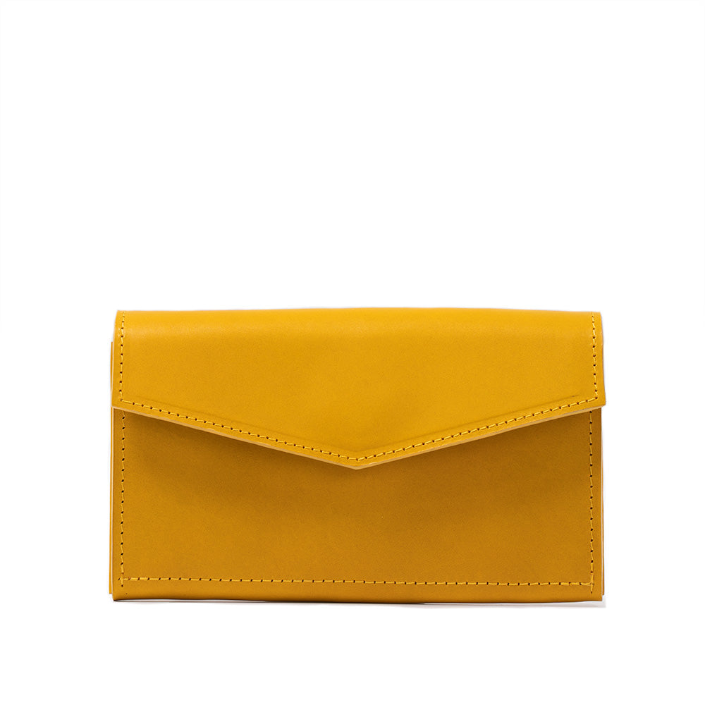 a yellow wallet with stitching
