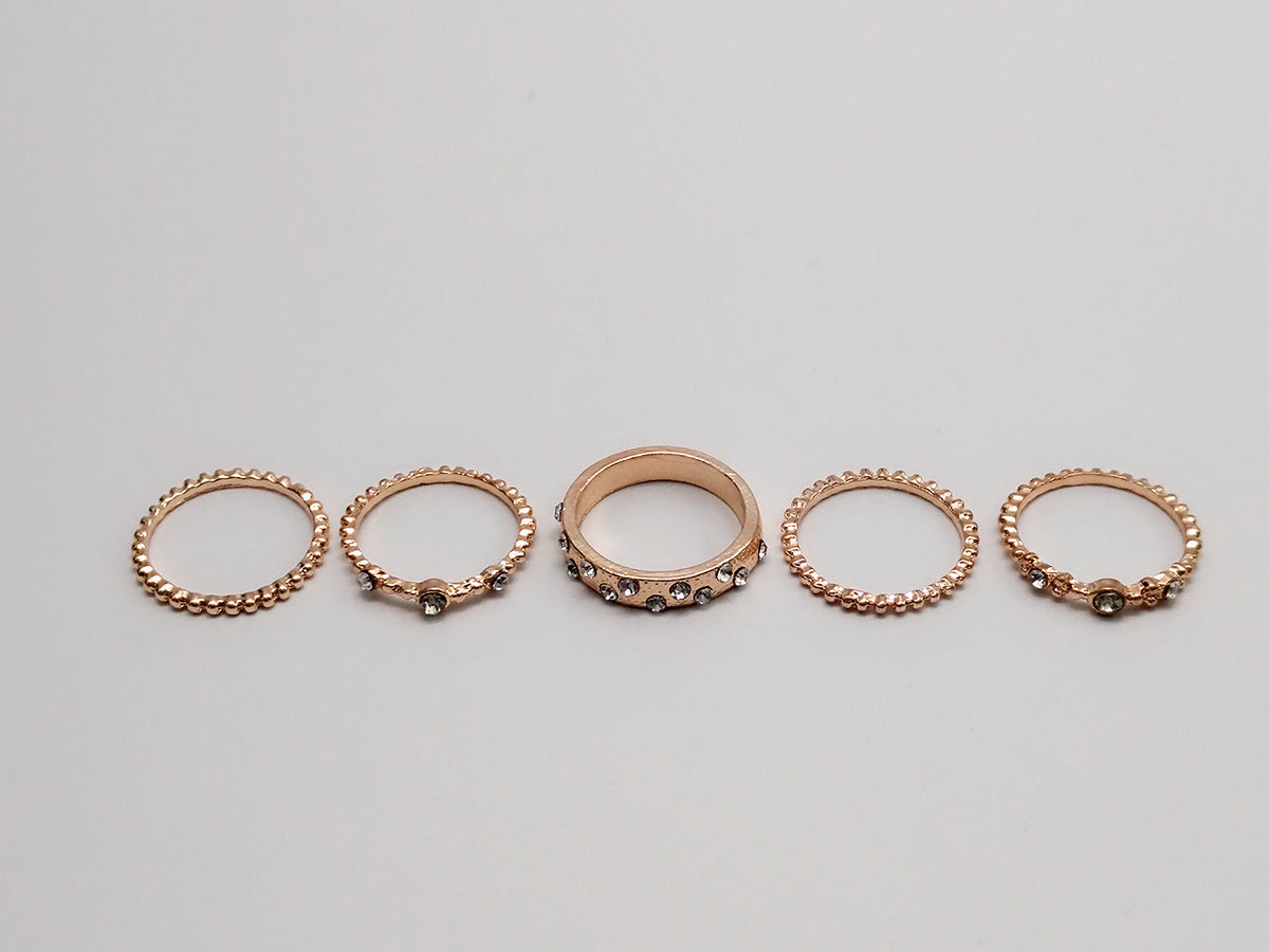 a row of rings with diamonds