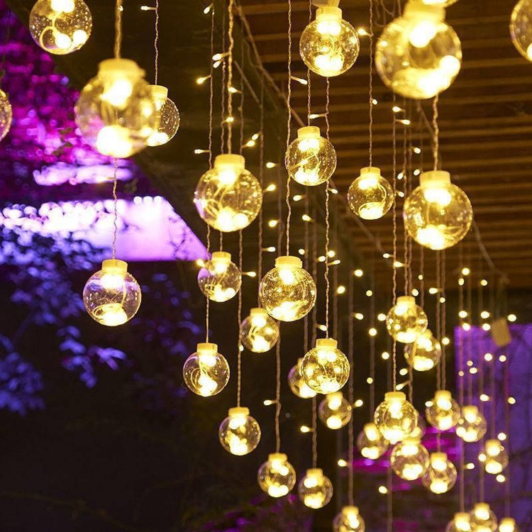 a string of lights from a ceiling