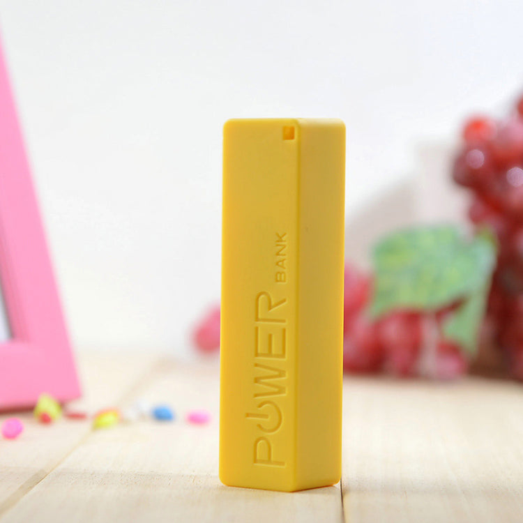 a yellow rectangular object on a table