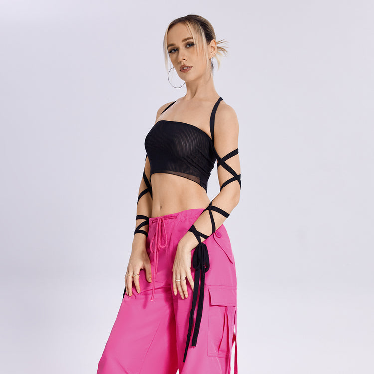a woman in pink pants