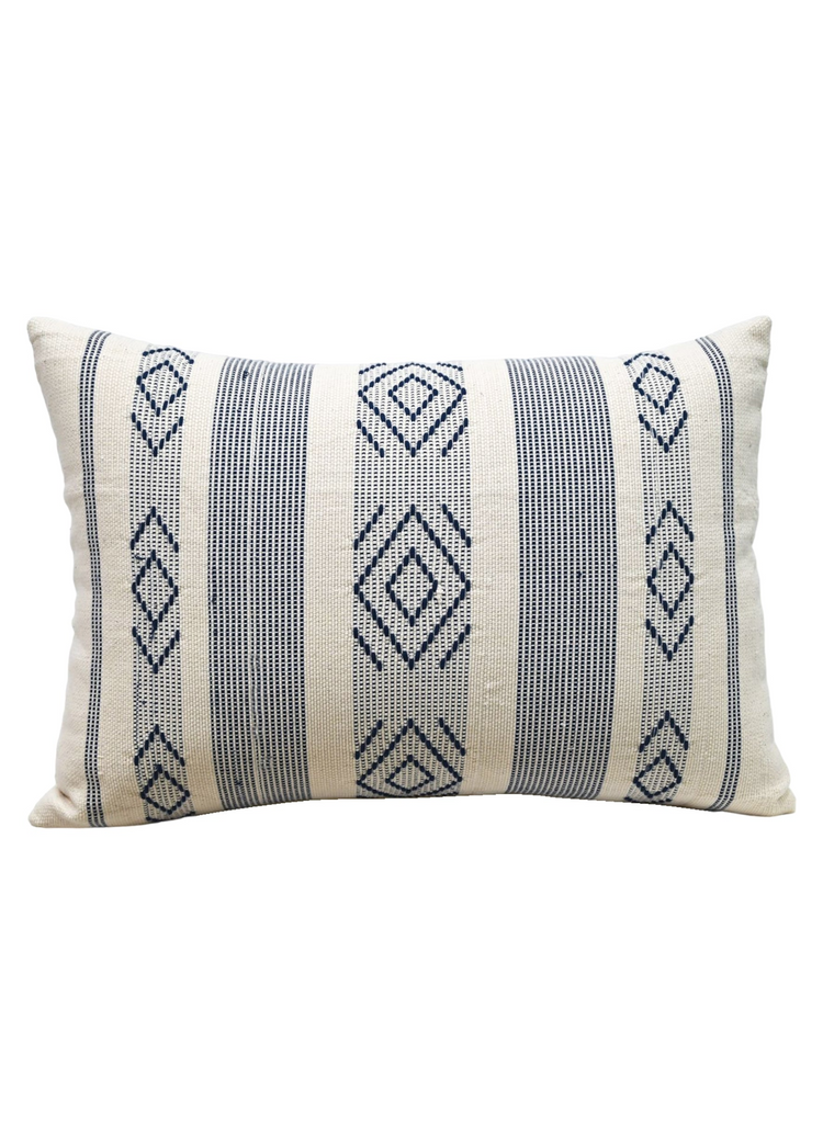 a white and blue pillow