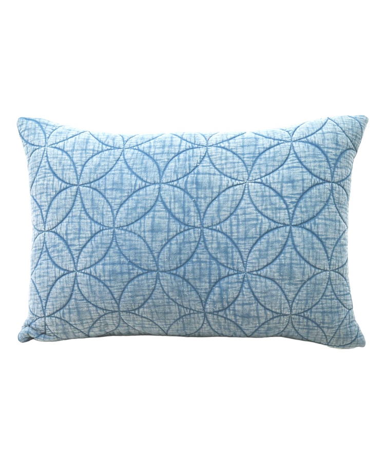 a blue pillow with a pattern
