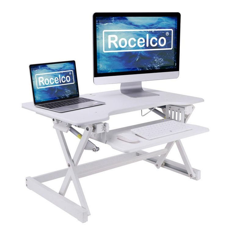 a laptop and a monitor on a desk