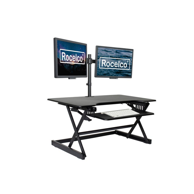 a black desk with two monitors
