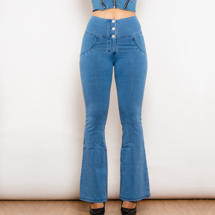 a woman wearing blue jeans