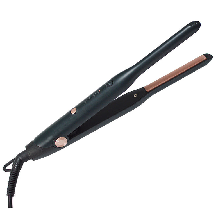a black flat iron with a pink handle