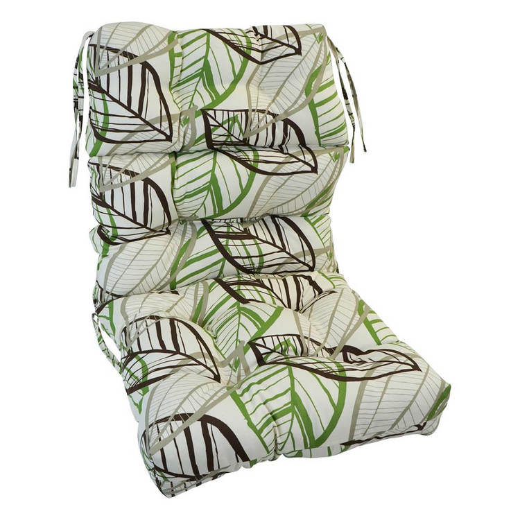 a chair cushion with green leaves on it