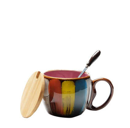 a mug with a spoon in it