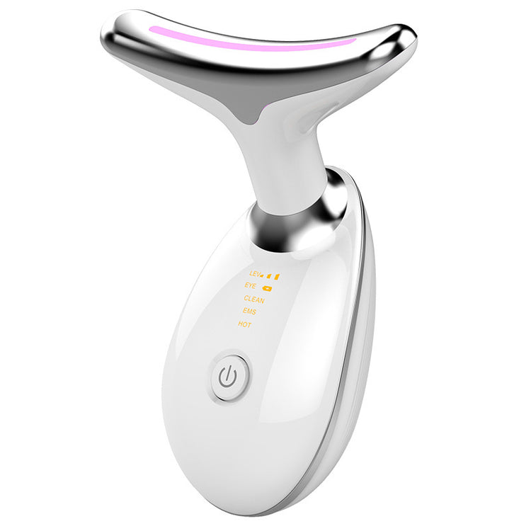 a white device with a light on the button