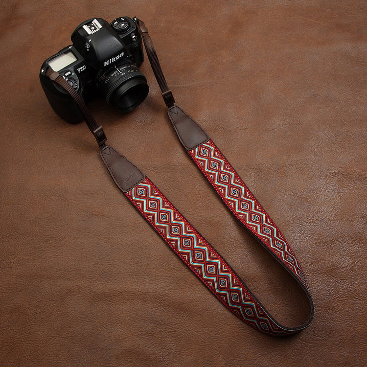 a camera with a strap
