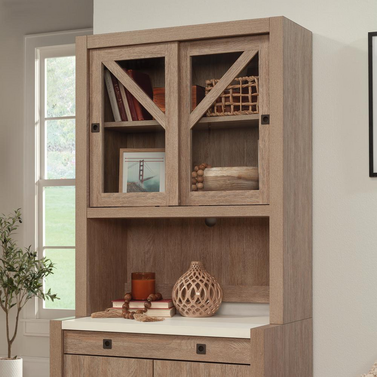 a wood cabinet with glass doors
