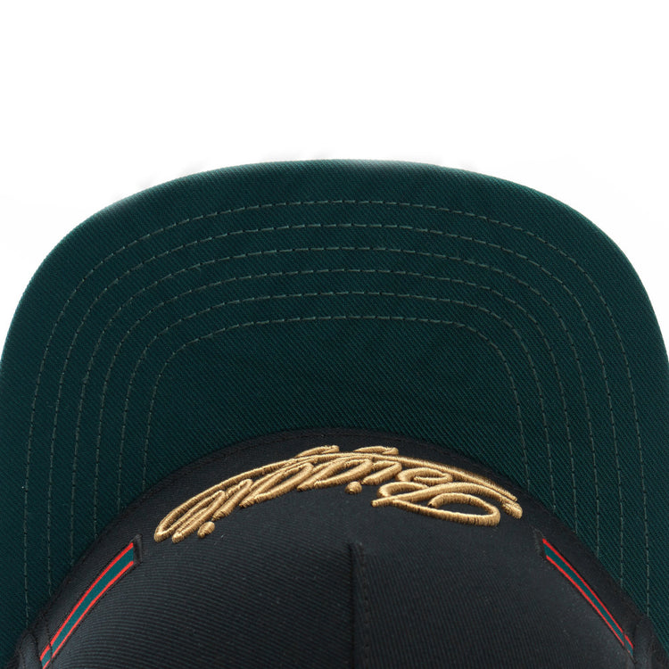 a black hat with a gold logo